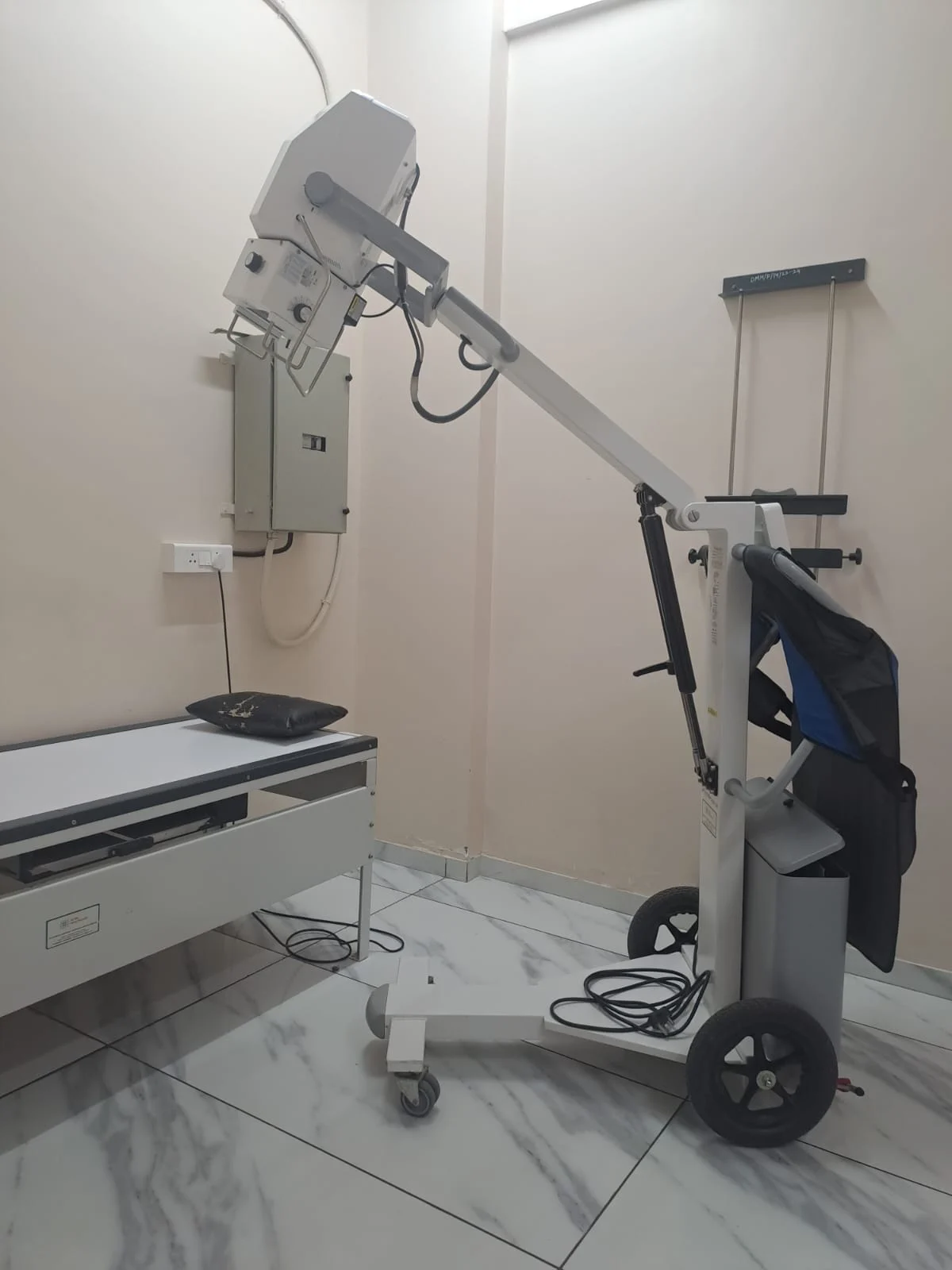 Digital X-ray machine and examination table at Deccan Malti Hospital