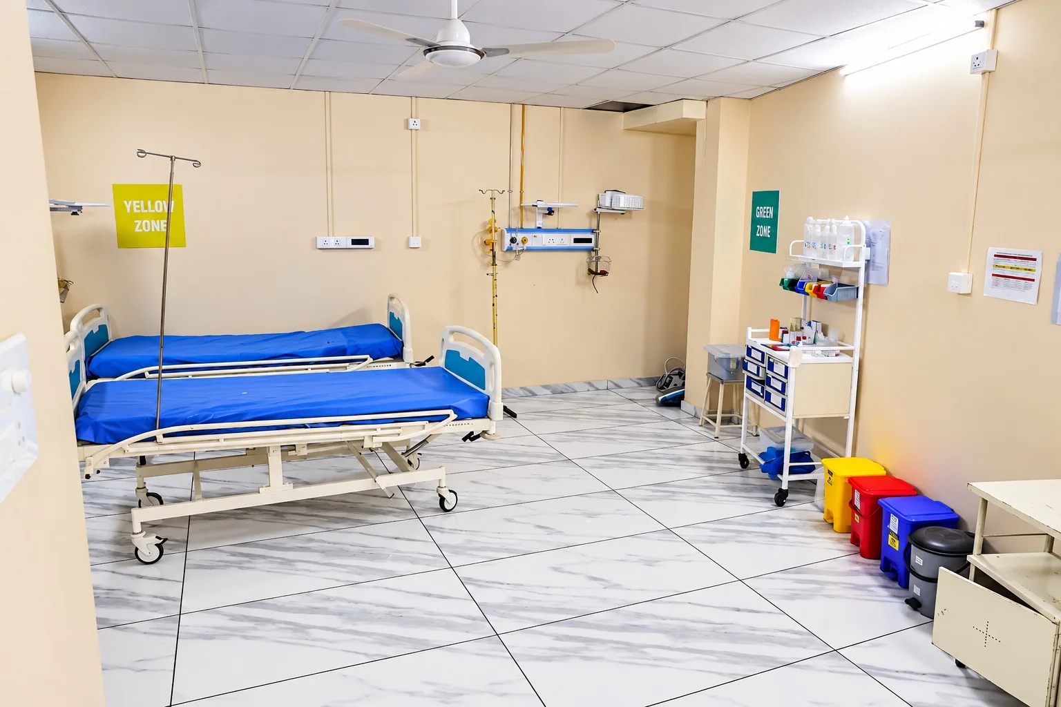 A quiet hospital room with a bed and clinical equipment